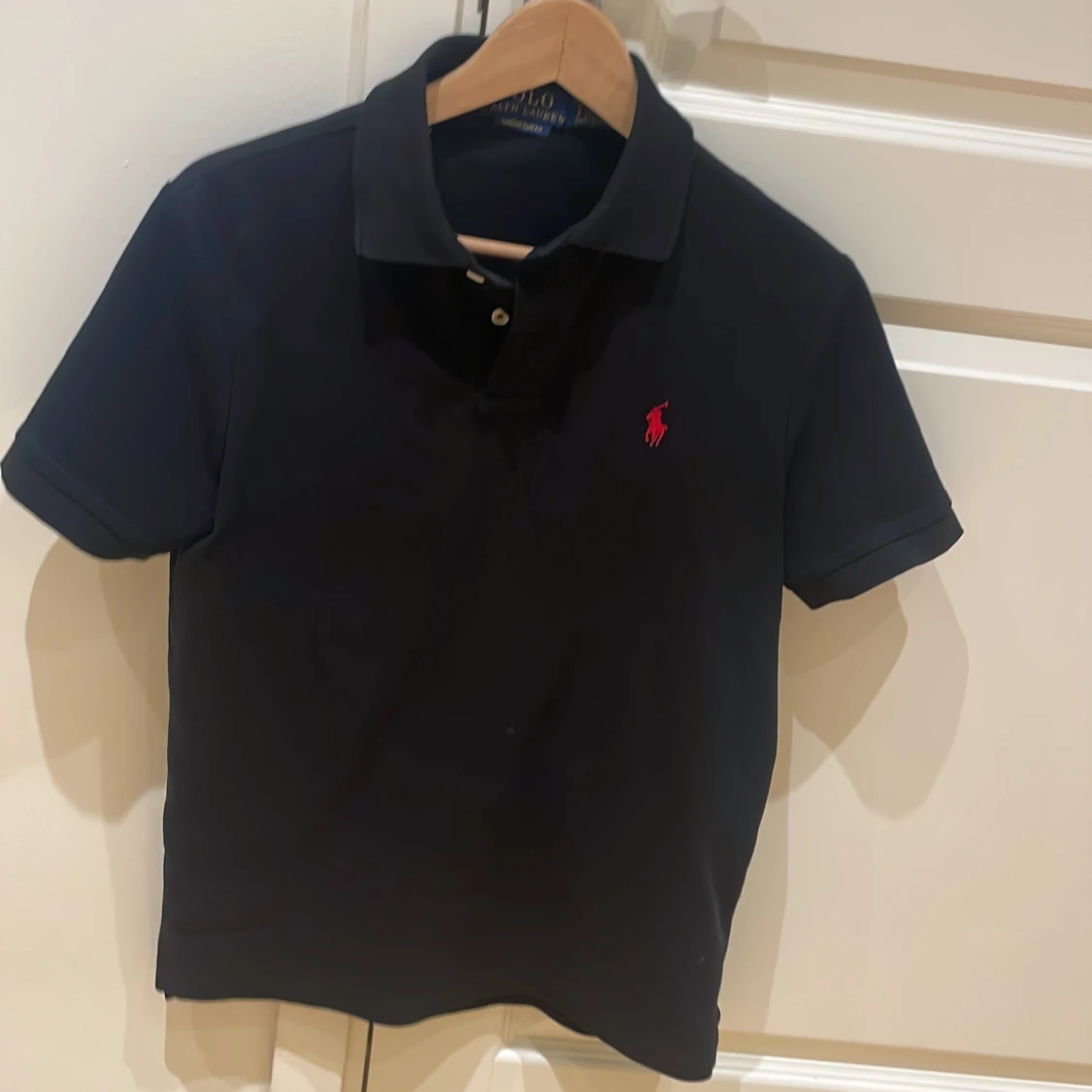 Svart piké från Ralph Lauren