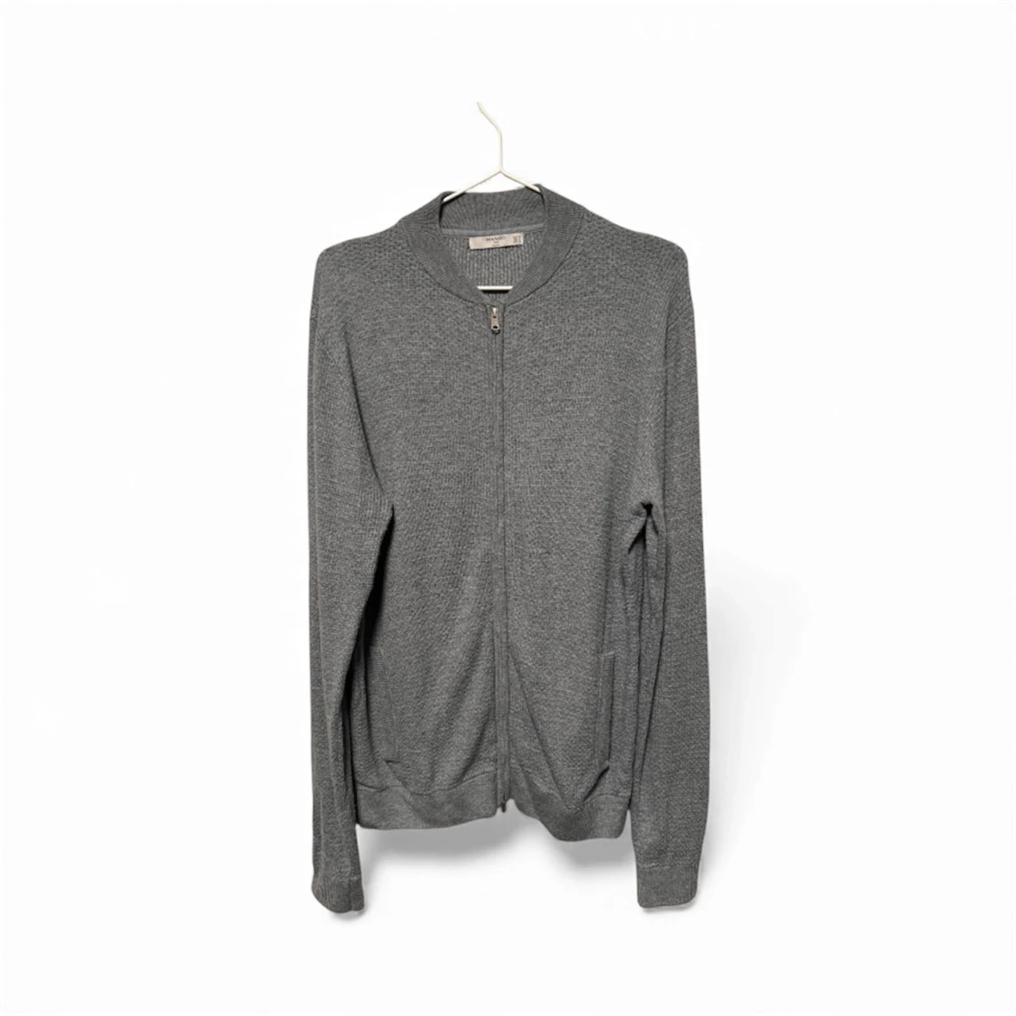 Grå kofta med dragkedja från Mango