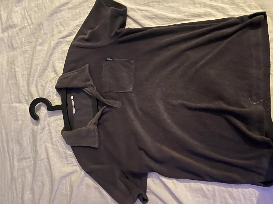 Svart pikétröja från WARP