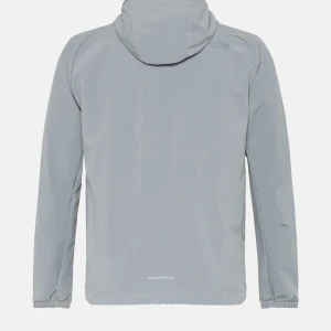 Ljusgrå vindjacka från The North Face - Snygg ljusgrå vindjacka från The North Face med huva och hel dragkedja framtill. Jackan har en praktisk bröstficka med dragkedja och elastiska muddar vid ärmslut. Perfekt för dig som gillar stilren och funktionell design.