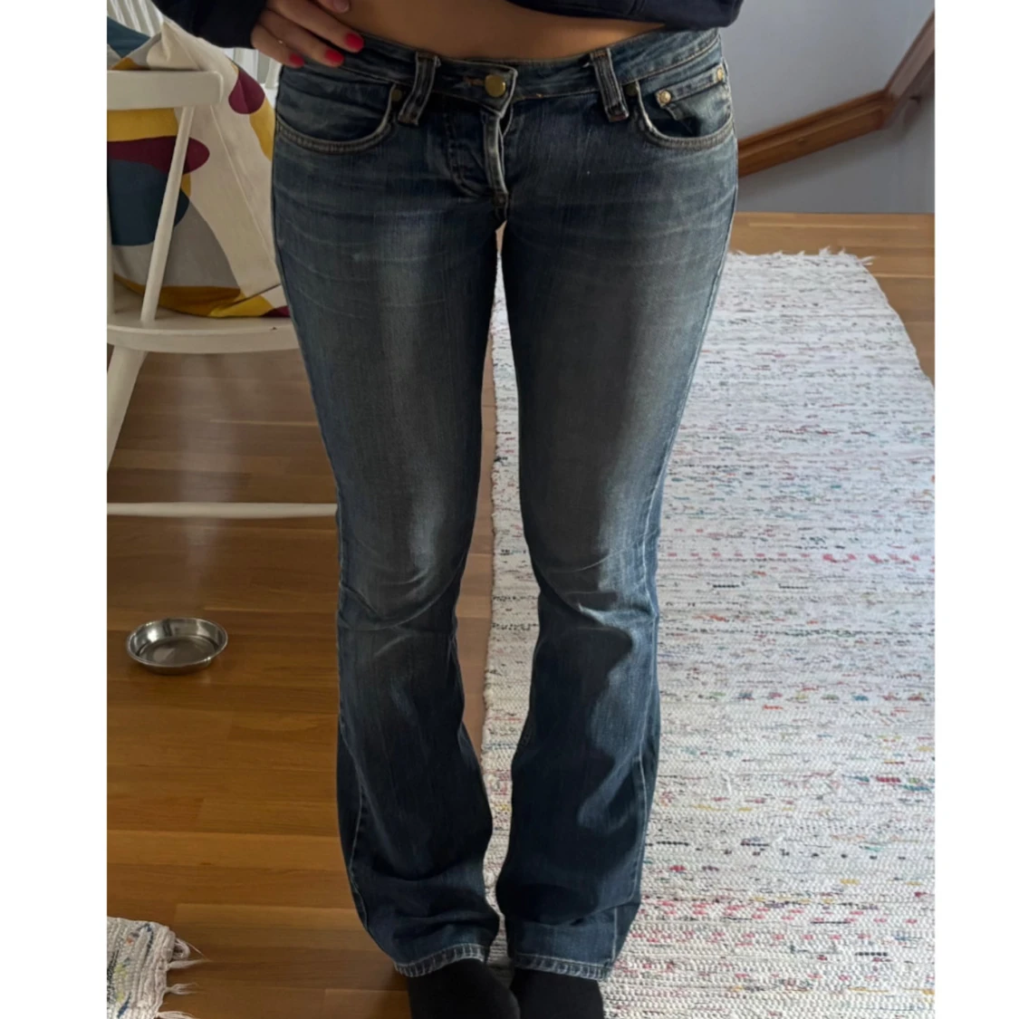 Blåa lågmidjade bootcut jeans
