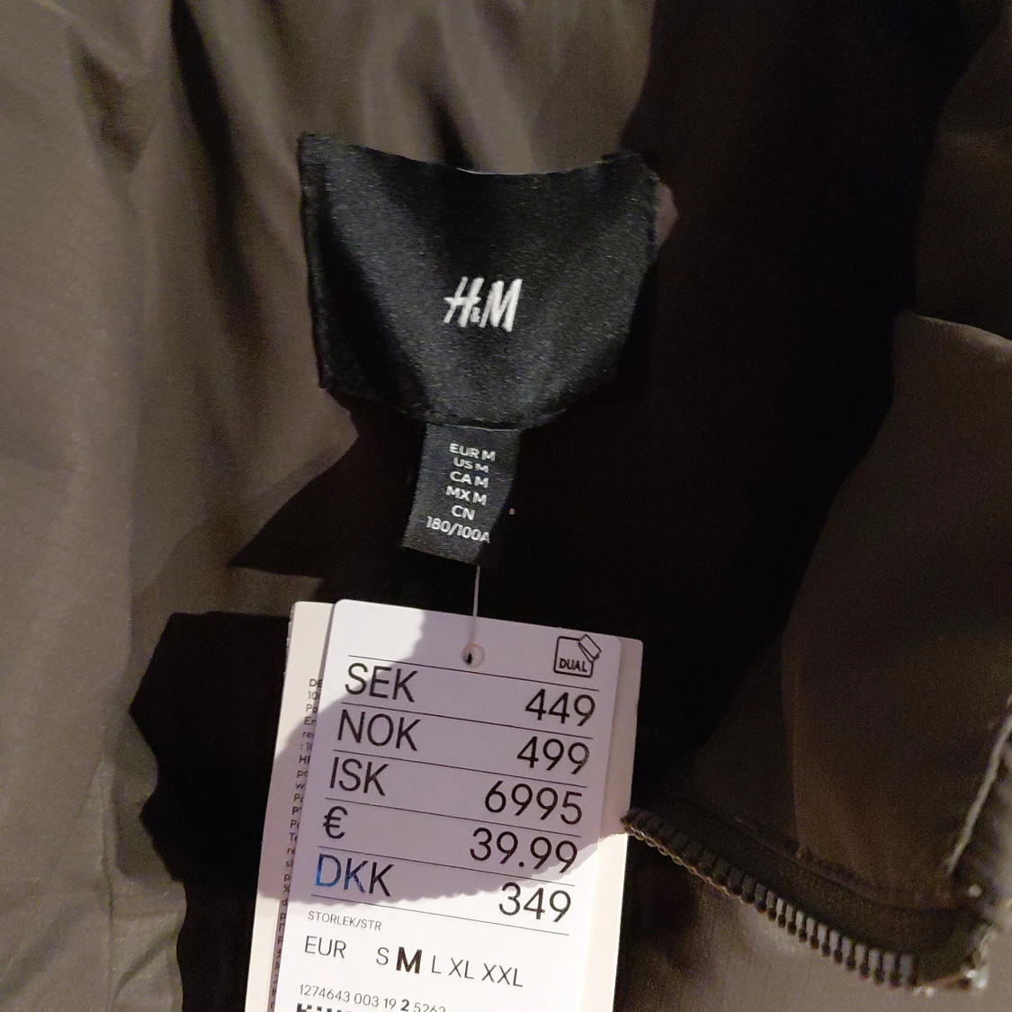 Grå dunväst från H&M, storlek M - 1