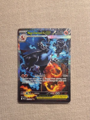 Mega charizard X ex phantasmal flame engelska  - Säljer en Mega charizard X ex phantasmal flame engelskt kort. Finns i Stockholm. Skickar inte.