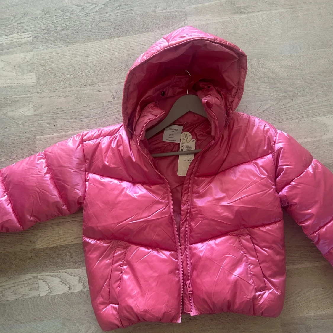 Rosa pufferjacka från Lindex Kids