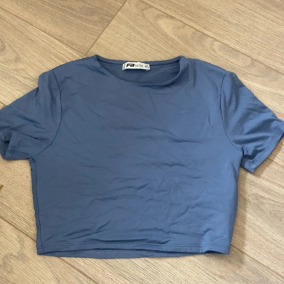 Blå croppad topp från PacSun