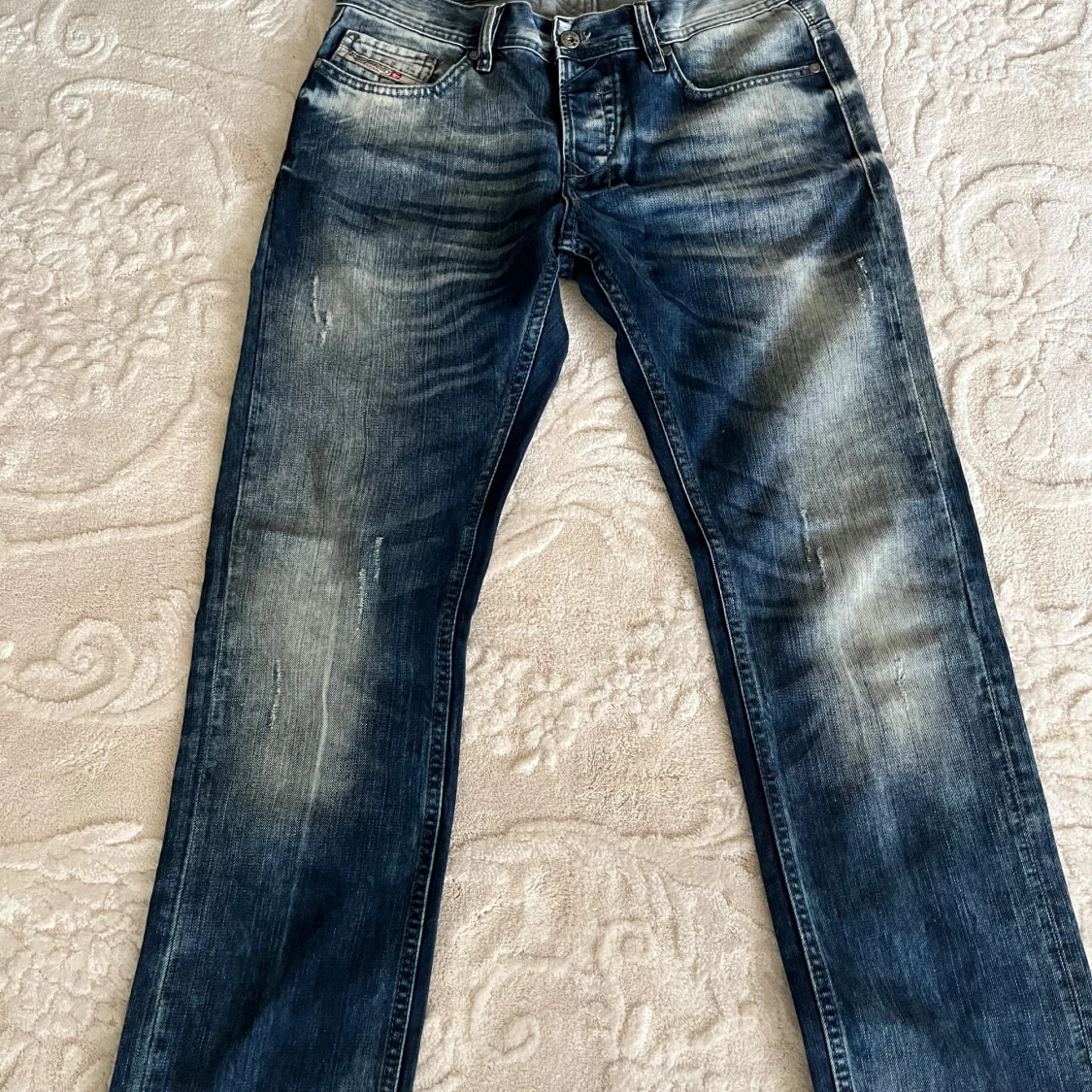 Diesel jeans i tvättad blå denim