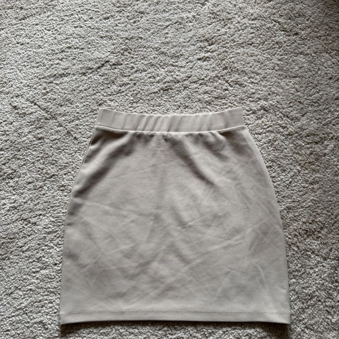 Beige kortkjol från NY Trend XS - 2
