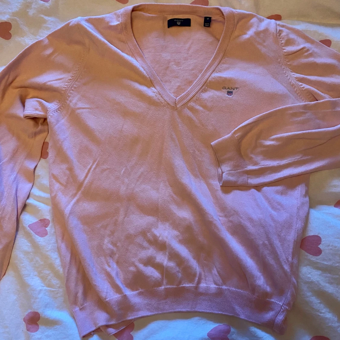 Rosa v-ringad tröja från Gant