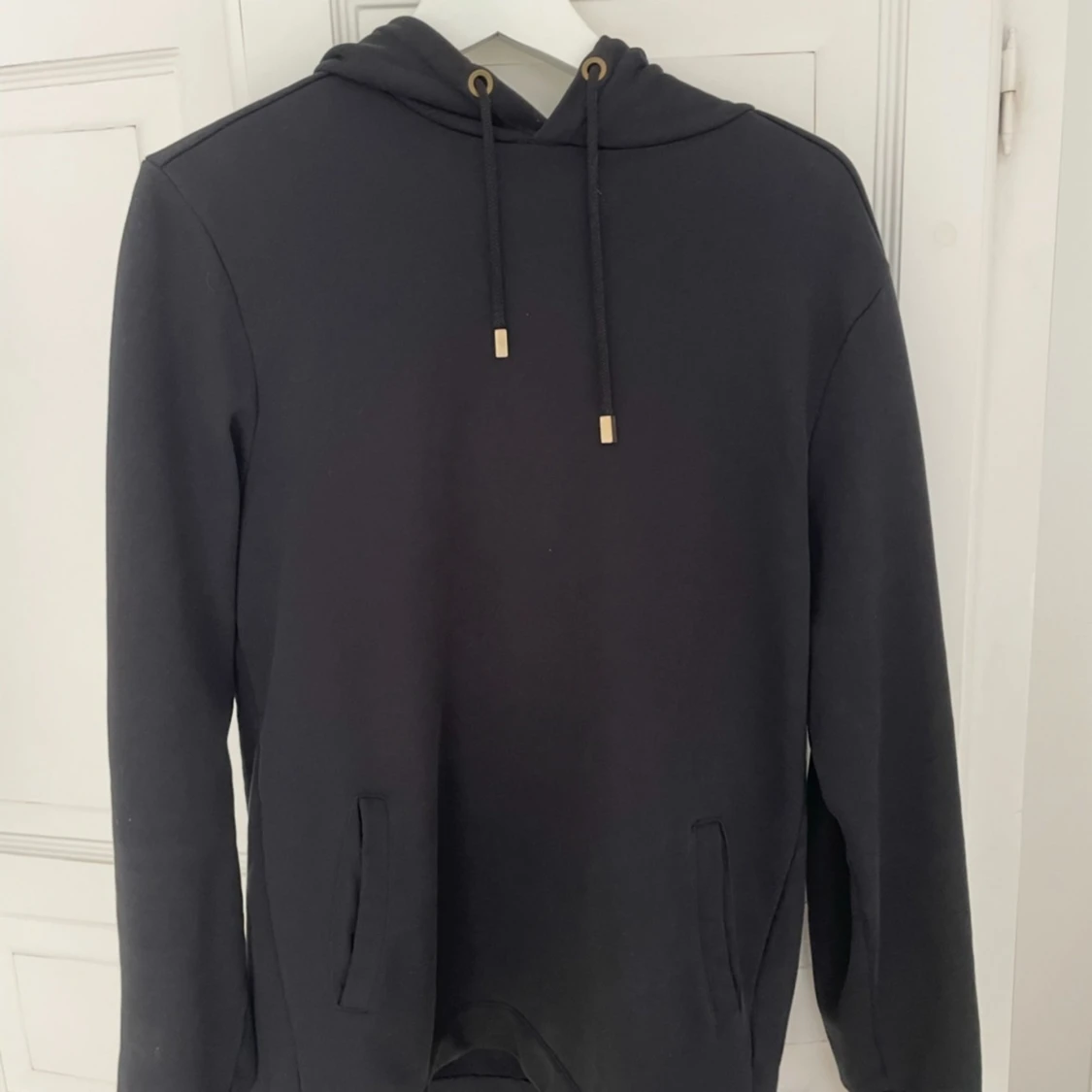 Svart hoodie från Limitato x Terry O'Neill