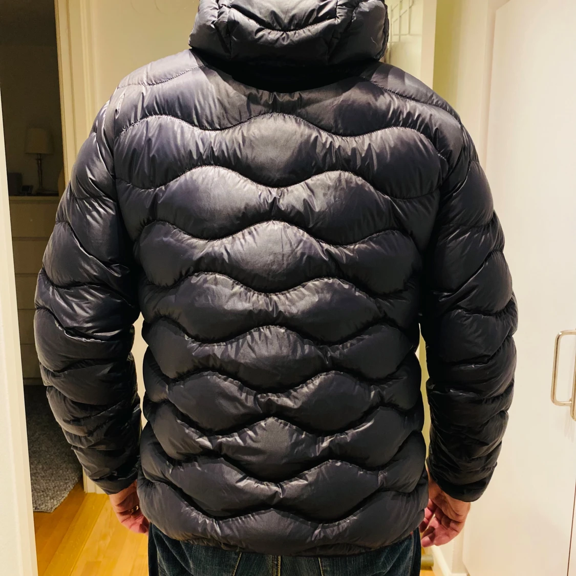 Svart dunjacka Peak Performance XL - 1