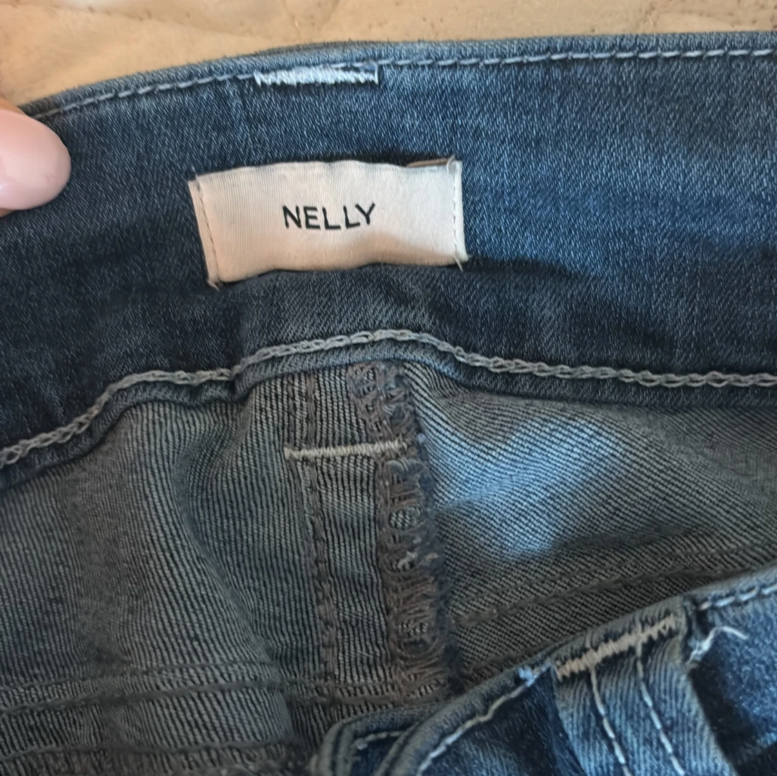 Blå bootcut jeans från Nelly, low waist - 1