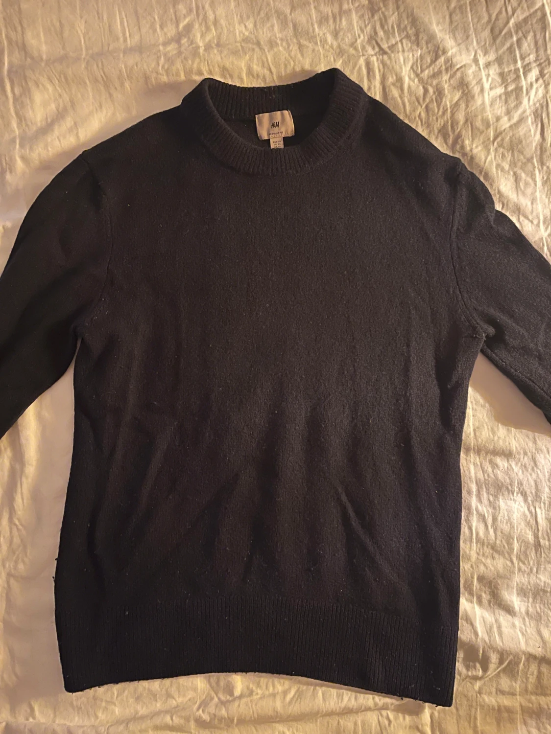 Mörkblå stickad tröja från H&M XS