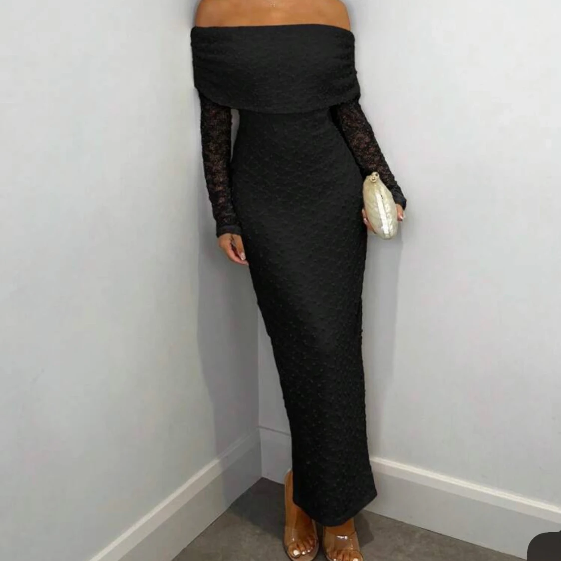 Svart långklänning med struktur