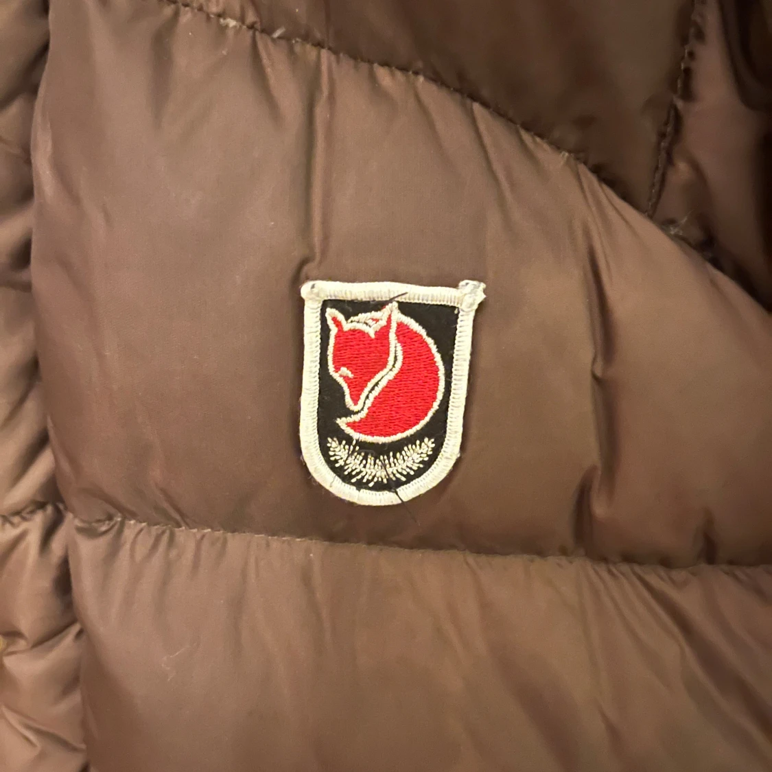 Brun dunjacka från Fjällräven XXS - 1