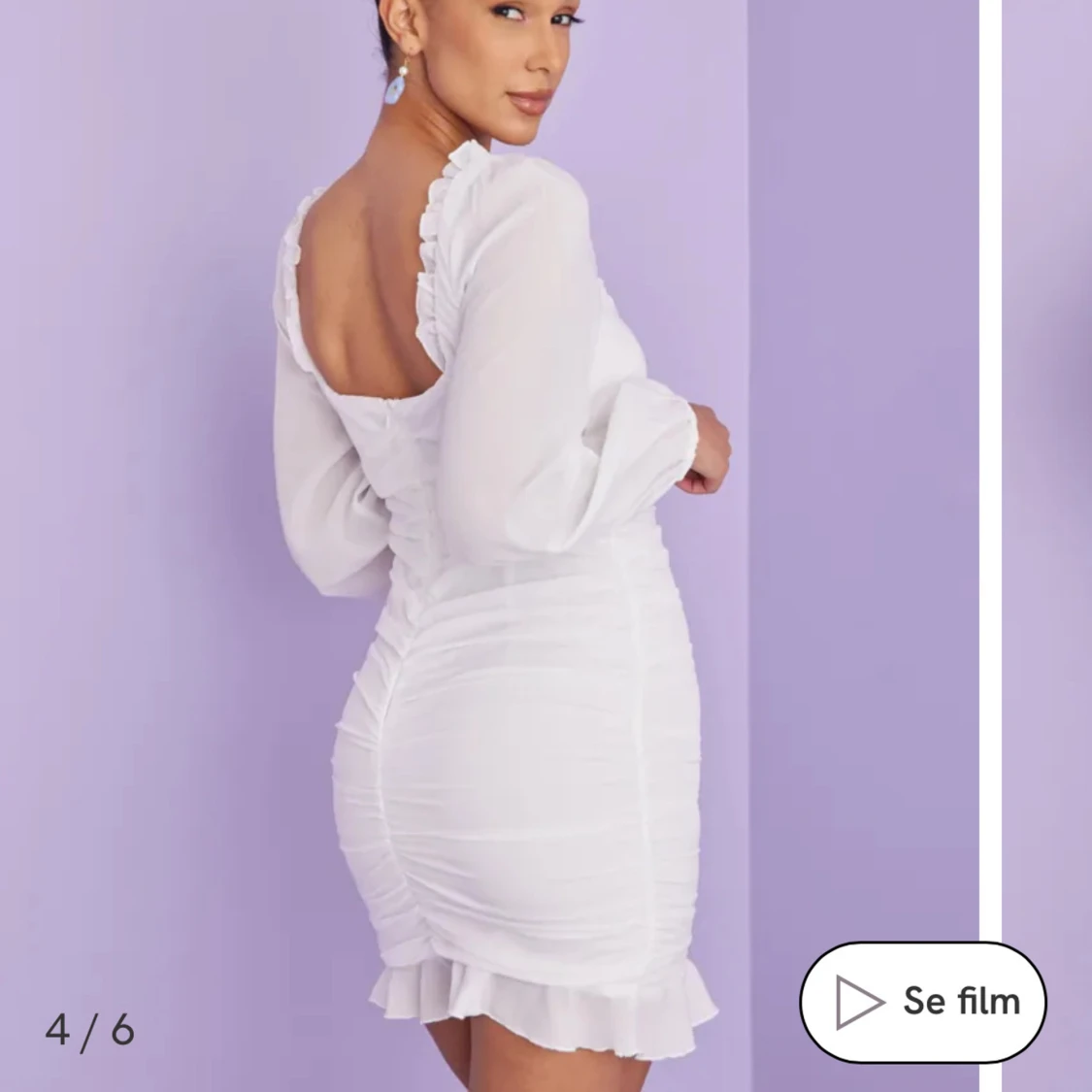 Vit omlottklänning med volang - 1