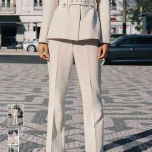 bootcut kostumbyxor - Beiga kostymbyxor från Zara, helt nya och aldrig använda. Mellan hög midja