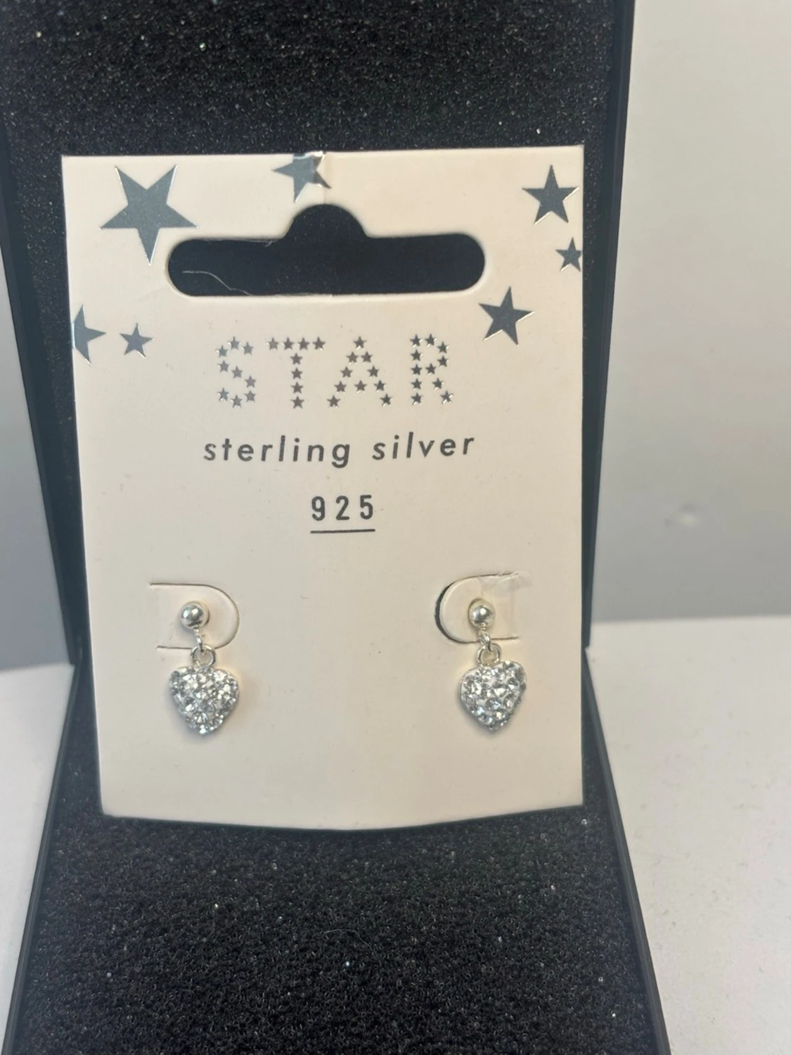 Silverörhängen med hjärtan från STAR