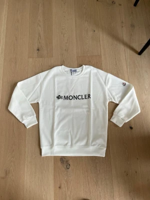 M white Sweathshirt - Size M-L. White sweatshirt. Never worn. Brand new. 