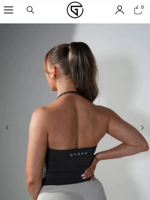 Grå halterneck sporttopp från GTECH - Halterneck topp från GTECH i färgen ”dark grey” i strl XS (som ny) nypris: 349kr 