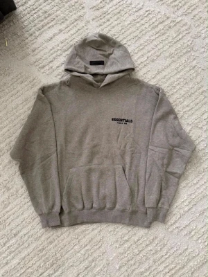 Essentials dark oatmeal gray hoodie - Never used, in amazing condition. Ask DM for more questions and follow insta to join our giveaways!