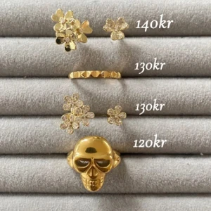 Guldfärgade ringar med blommor och dödskalle - Ringar 