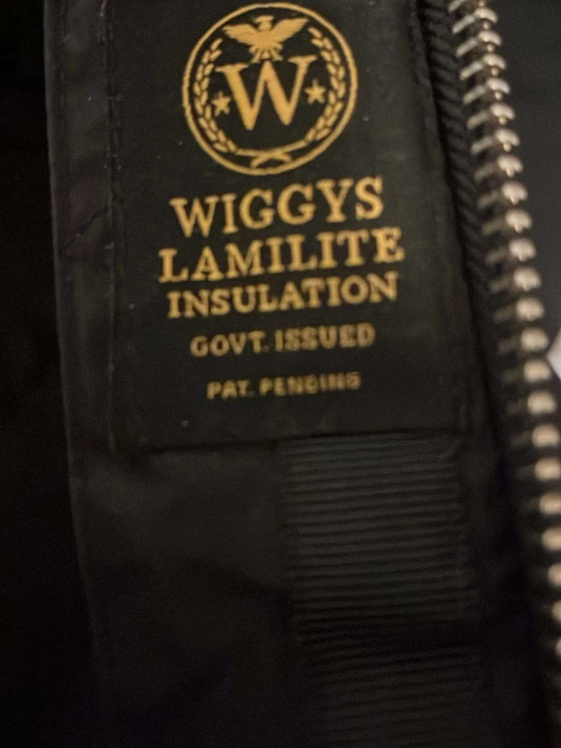 Svart parkas med äktapäls  från Woolrich - 2