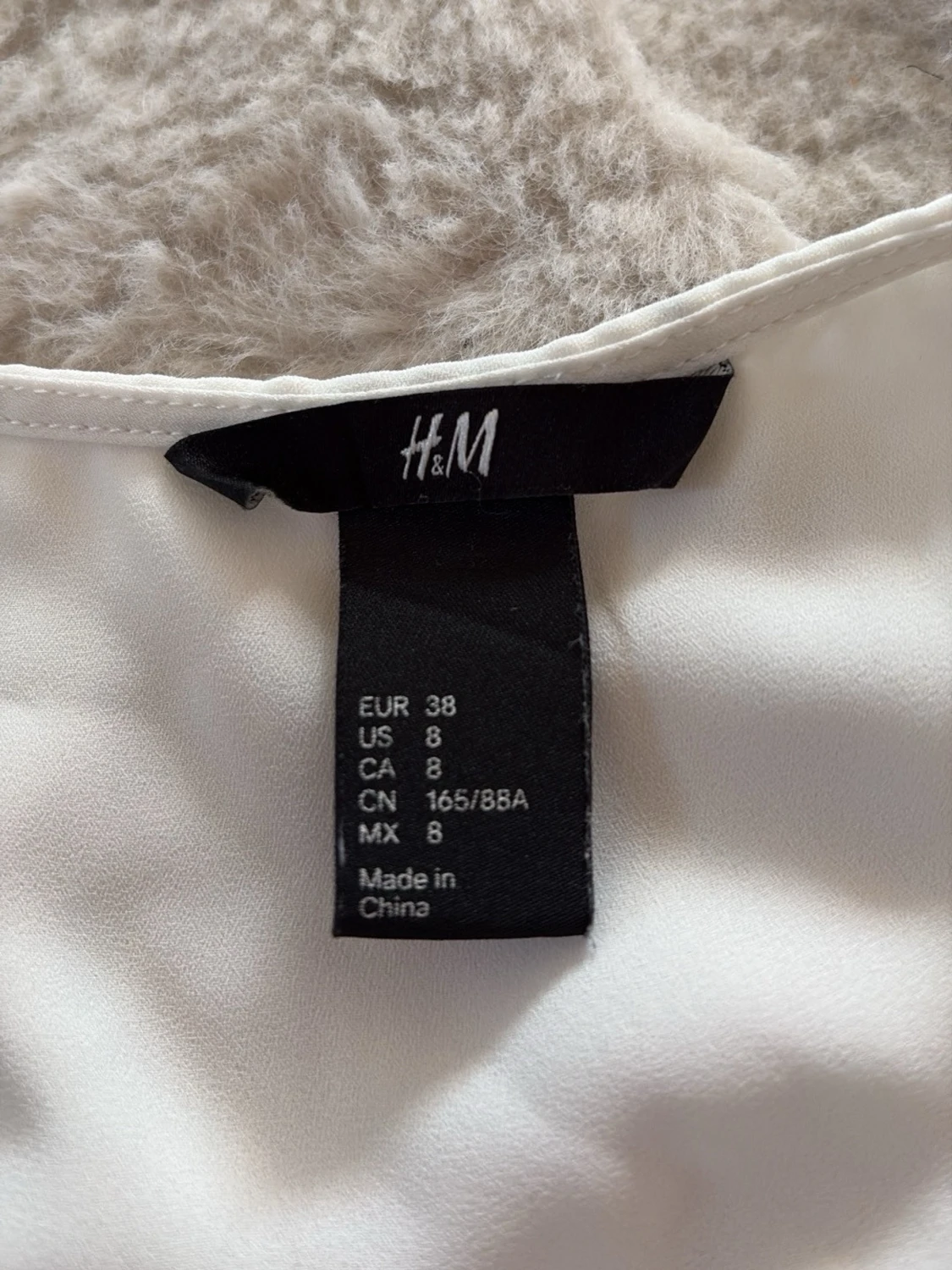 Vit ärmlös blus från H&M - 1