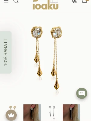Ioaku Örhängen  - Helt nya guldiga örhängen från Ioaku.           Nypris 699kr