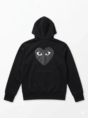 Svart hoodie från Comme des Garçons Play - Svart hoodie med dragkedja från Comme des Garçons Play. Ikoniskt hjärta med ögon på ryggen och mindre hjärtdetalj på bröstet. Två fickor fram och justerbar huva. Perfekt för en stilren och cool look.