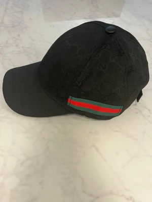 Keps  - En oanvänd keps , fint till sommaren eller när det är soligt 