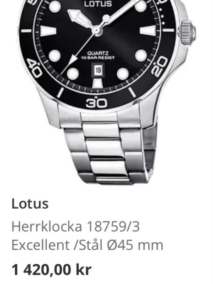 Lotus herrklocka - Snygg herrklocka från Lotus med svart urtavla och datumvisning. Klockan har en robust länk i blankt stål och tydliga indexmarkeringar. Klassisk design som passar till många stilar. Boetten är 45 mm i diameter och klockan har kvartsverk. Väldigt stilren och passar till allt. pris kan såklart diskuteras!👍
