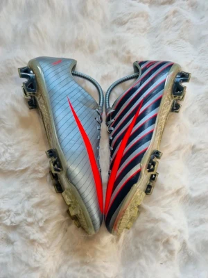 Nike Mercurial Vapor VII CR7 Elite FG - Nike Mercurial Vapor VII CR7 Elite FG I väldigt bra skick.   Inga skador förutom en små repa. Kolla sista bilden!  Skick: 8/10 Storlek: 45 Produktkod: 476712-464 