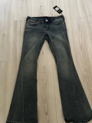 Nya Väldigt fina True religion jeans  - Ljusblå färg, skönt och stretchigt tyg, size 27, har aldrig använt.