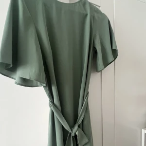 Klänning - Använd en gång, nyskick, finns i Göteborg men kan även frakta.