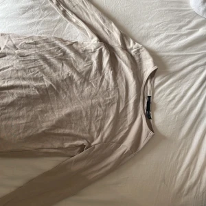 Säljer  - Långarmad tröja tunn 