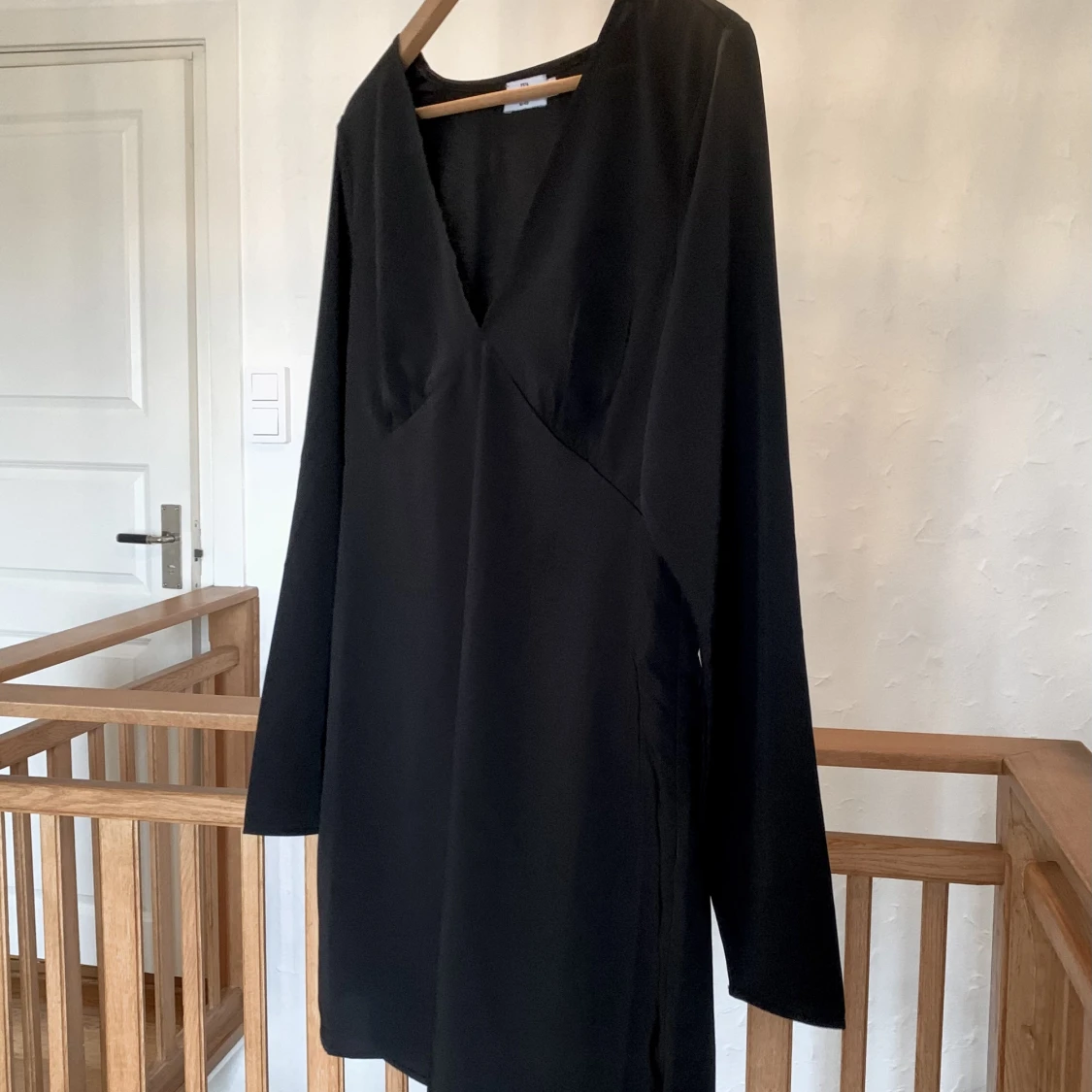 Svart långärmad klänning