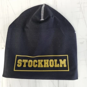STOCKHOLM mössa beanie oanvänd  - Mössa med tryck  One size  Helt oanvänd 