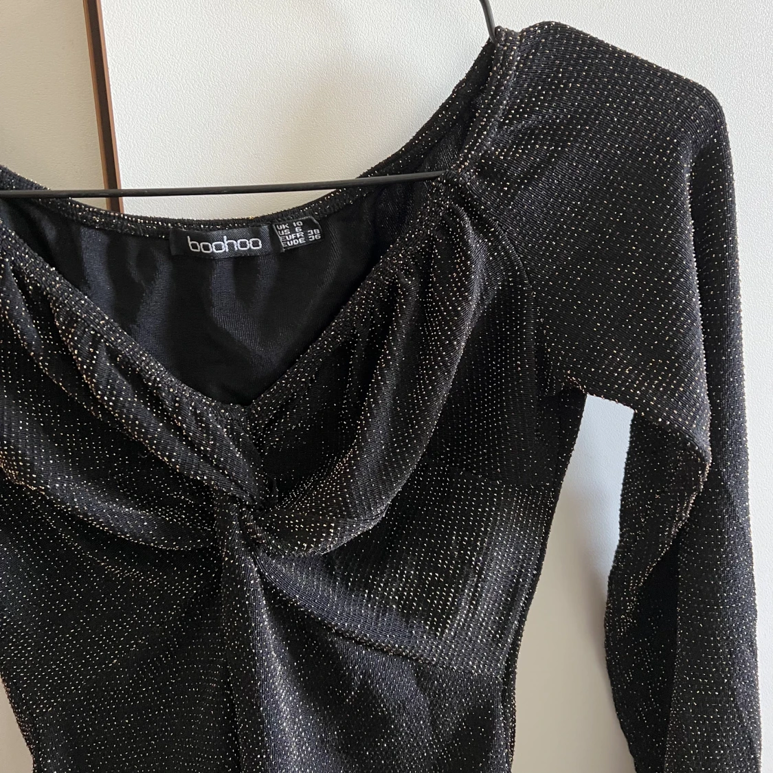 Långärmad glittrig body - 90