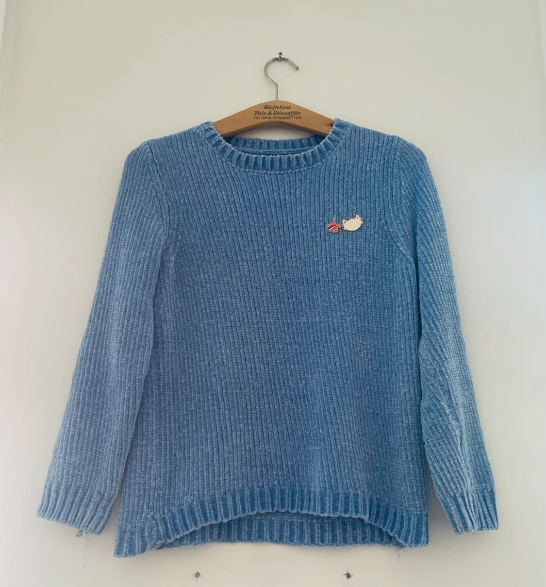 Blå stickad tröja
