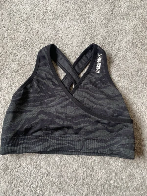 Gymshark topp  - . Aldrig använd, djur-/rökfritt hem