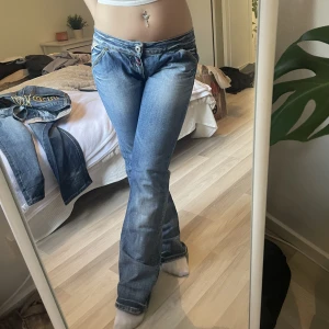 Jeans Replay - Replay jeans lågmidjade utsvängda