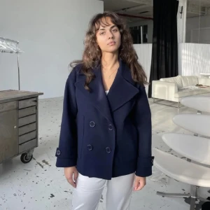 Kappa designbysi - Säljer denna kappa från designbysi då den ej kmr till användning. Ny skick, frakt tillkommer! 