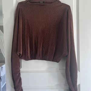 Topp från Bianca x Nelly  - Topp från Biancaxnelly i strl 40, passar även en 38, endast använd en gång