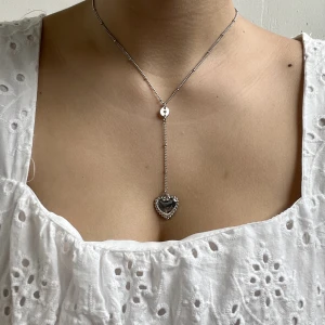 Silverhalsband - Halsband i silverfärg från Brandy Melville