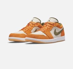 Nike Air Jordan 1 Low Top Sneakers - Air Jordan 1 Low Orange Olive  The Air Jordan 1 Low SE ‘Ceramic’ applies refined earth tones to a low-profile silhouette modeled after the 1985 original. The upper combines an off-white canvas base with orange suede overlays and an olive green suede Swoos
