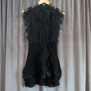 Spetsklänning - Använd men väl omhändertagen 