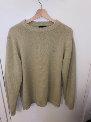 GreenLand sweater - XL size, I’m s/m and it looks nicely oversized on me. Nice quality and warm.  70% acrylic 30%wool