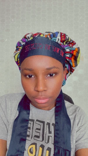 African bonnet  - An African bonnet with a satin lining is a headwear designed to protect your hair while you sleep. The satin lining reduces friction, preventing hair breakage and preserving hairstyles. It's an easy and comfortable way to keep your hair healthy and strong