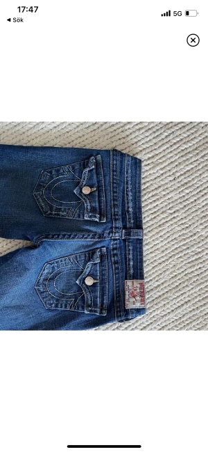 True religon byxor - Ett par bootcut truereligon med 37 cm rakt över midjan, 75 innerben och 95 ytterben
