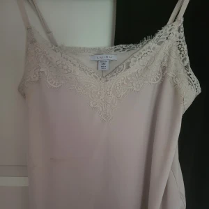 Spwtslinne - Spetslinne amisu